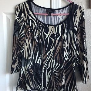 Fun animal print top with sequins.